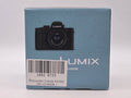 Panasonic Lumix G100D with 12-32mm lens - front view